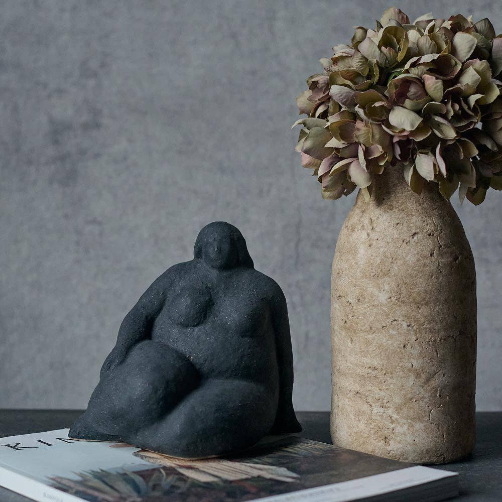 La Sculpture Rolinda Les Choses qu'on Aime à table